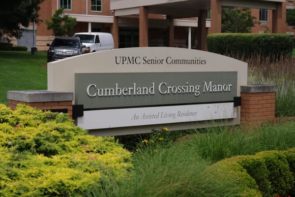 Sign for Cumberland Crossing Manor, an assisted living facility.