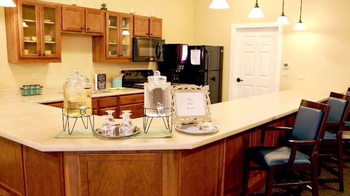 A welcoming kitchen area with seating and refreshments