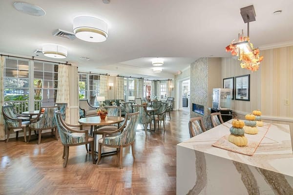 Bright common area with seating and decorative elements