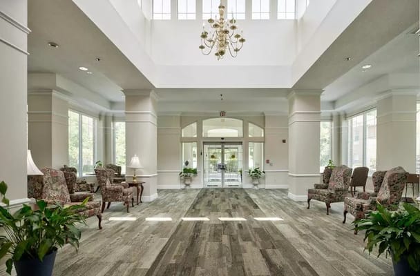 Bright and spacious lobby with seating and plants
