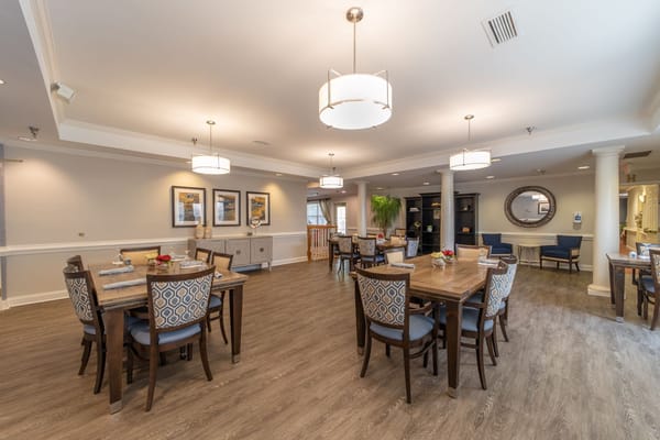 Bright dining room with wooden tables and chairs
