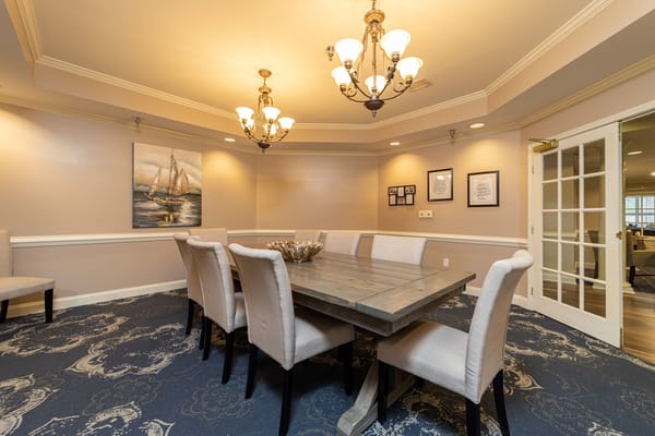 Bright dining room with wooden table and chairs