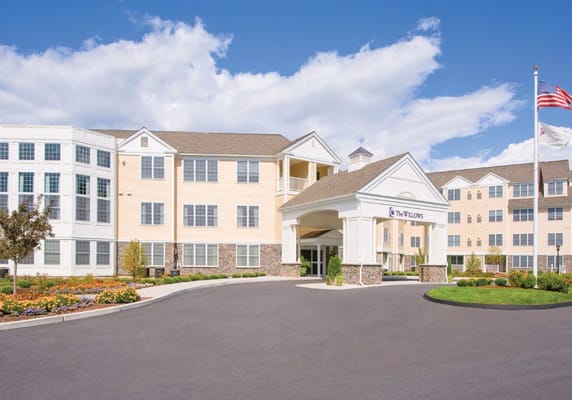 Exterior view of The Willows senior living facility