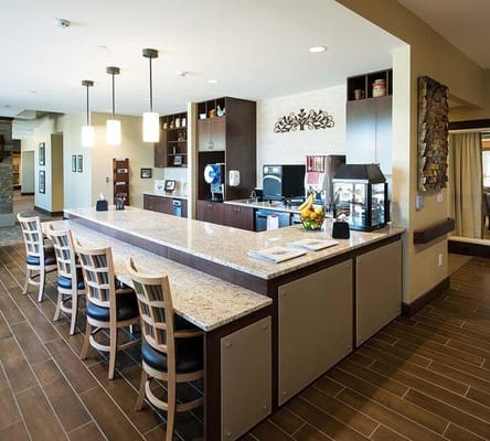 Interior view of the kitchen cafe with a bar and seating