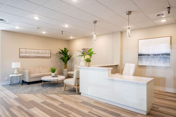 Welcoming lobby with seating and reception desk