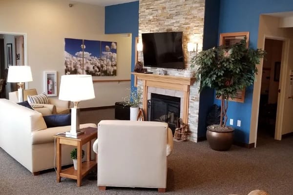Spacious living room with a fireplace and seating area