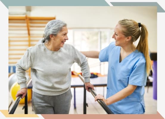 A senior woman engages in a therapy session with a caregiver.