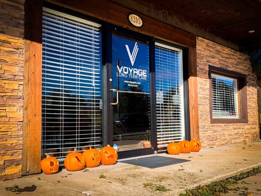 Carved pumpkins at the entrance of Voyage Long Term Care