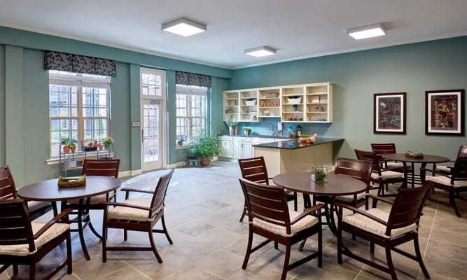 Bright dining area with tables and chairs