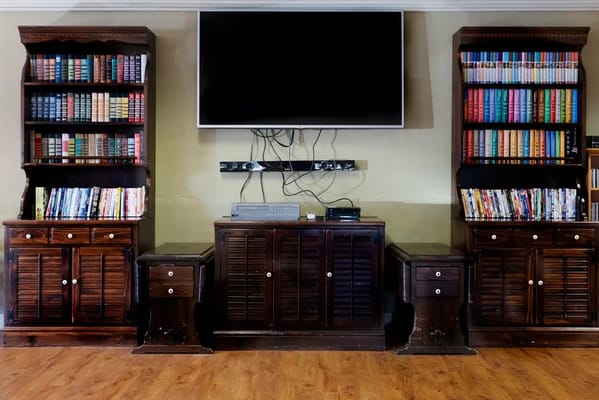 Bookshelves and television in the living room area