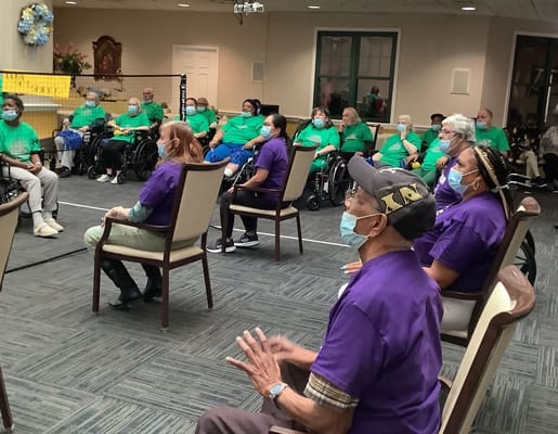 Residents participating in an indoor group activity