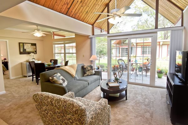 Bright interior view of a common area with outdoor access