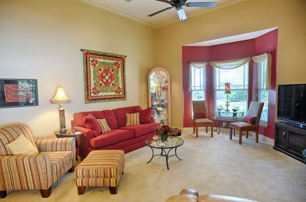 Bright common area with comfortable seating and decor