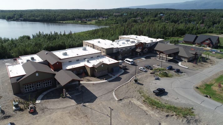 Aerial view of Maple Springs of Wasilla facility with surrounding nature