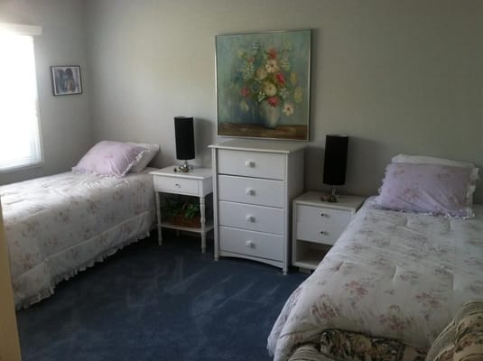 Cozy resident bedroom with floral decor