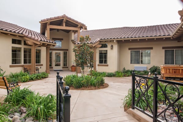 Exterior view of a senior living facility courtyard