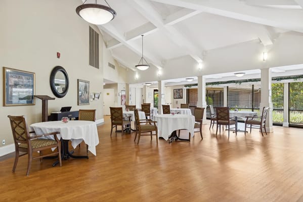 Bright dining area with tables and chairs
