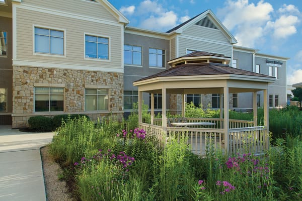 Exterior view of The Wellshire Morton Grove with a gazebo