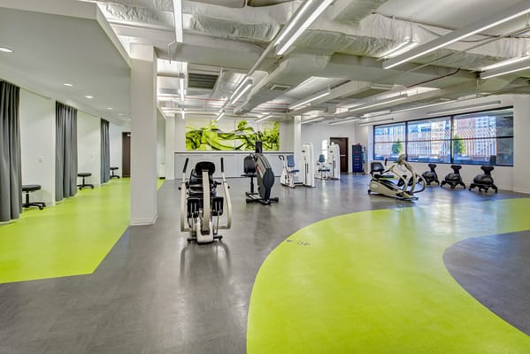 Modern fitness room with exercise equipment
