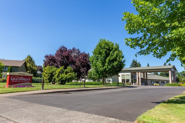 View of Green Valley Rehabilitation Health Center with landscaping