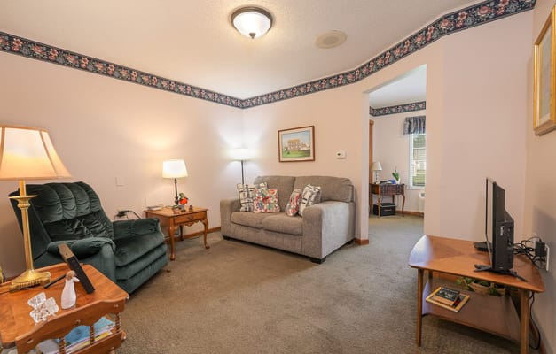 Cozy interior resident room with seating and decor