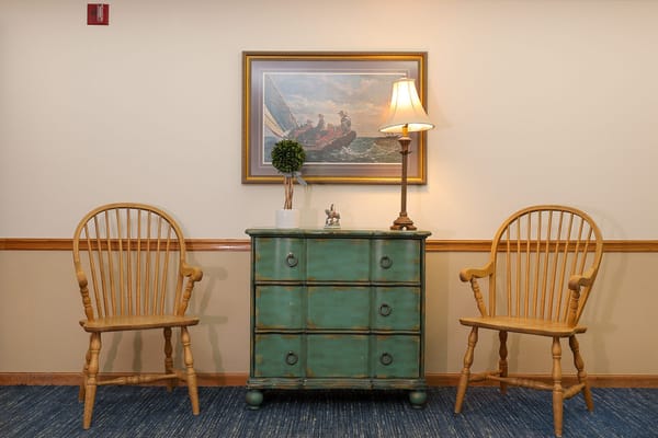 Cozy interior setup with chairs and a lamp