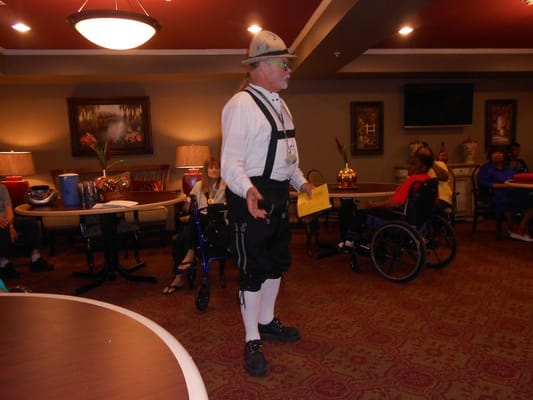 Staff entertaining residents in a common area