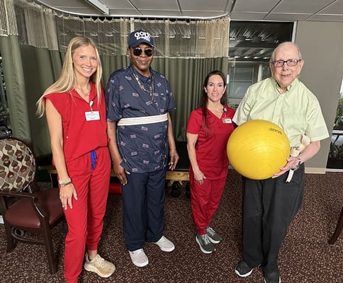 Residents and staff engaging in physical activity