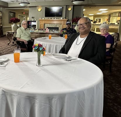 Residents enjoying meals in the dining room