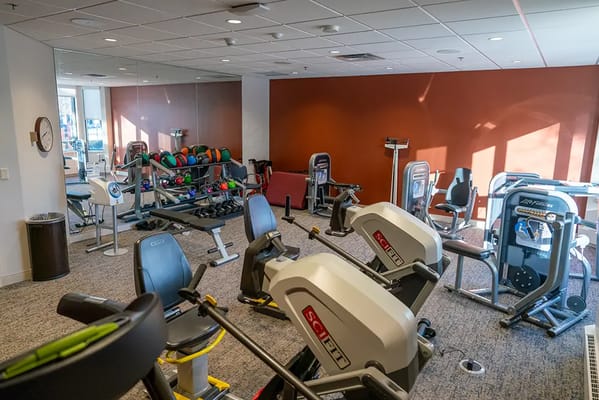 Interior view of a fitness area with exercise equipment
