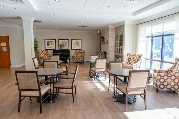 Bright common area with comfortable seating and natural light