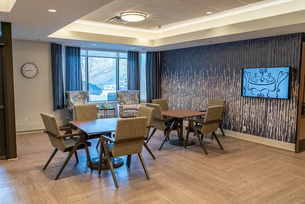 Common area with seating and a television