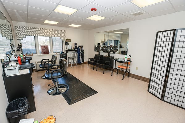 Stylish salon interior with hair styling stations