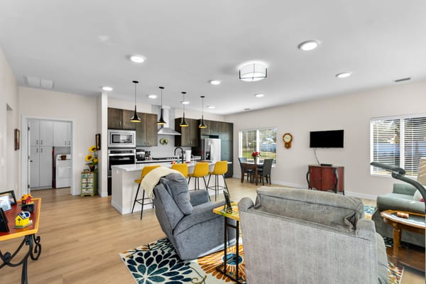 Bright living area with kitchen and seating