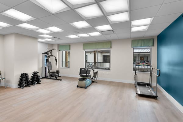 Bright activity room with fitness equipment