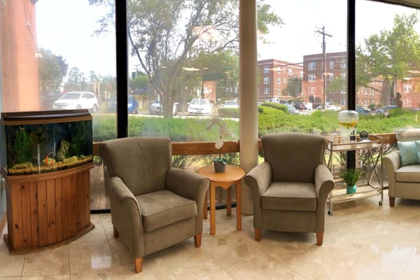Cozy common area with seating and natural light