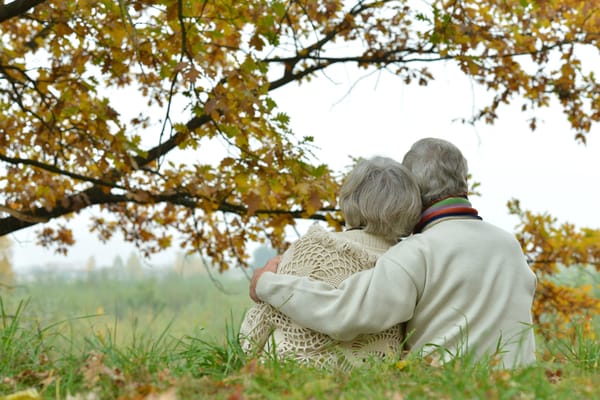 Elderly couple enjoying nature in an outdoor setting