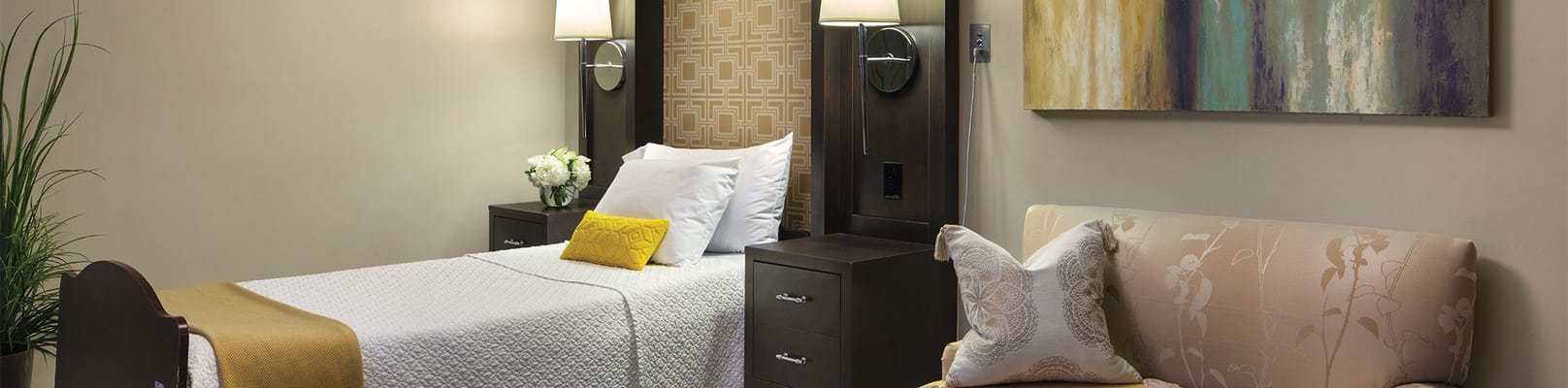 A well-furnished resident room with a cozy atmosphere