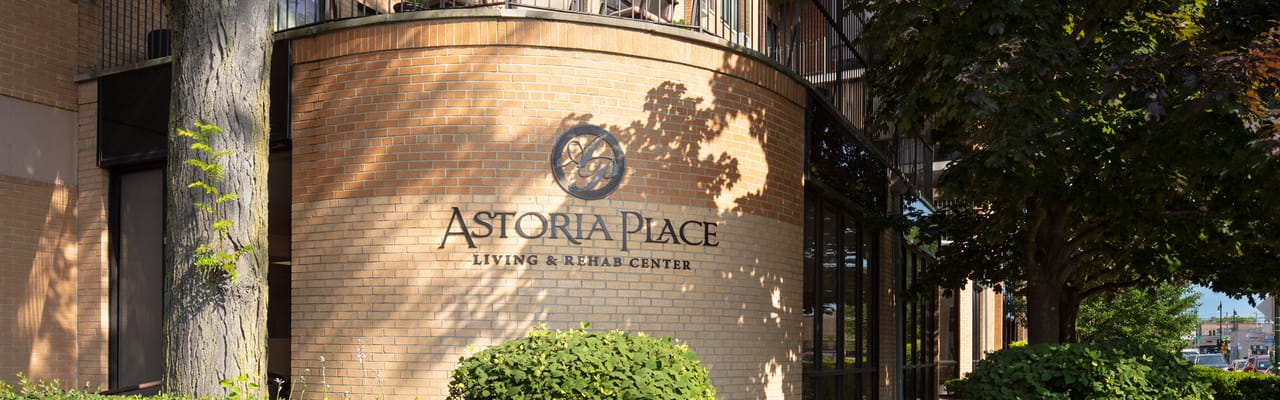 Exterior logo sign of Astoria Place facility