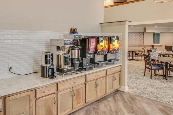 Beverage station in a common area with seating