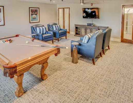 Common area with seating and a pool table