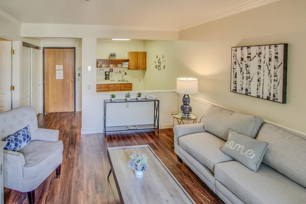 Bright and welcoming living room in a resident unit