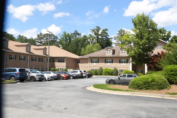 View of the parking lot and buildings at Summerset Assisted Living.