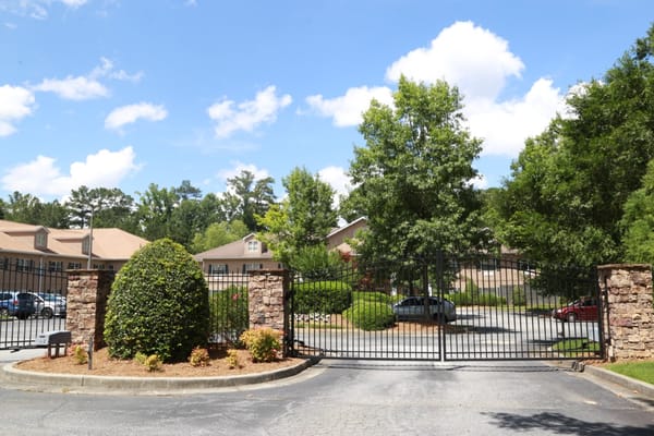 Black wrought iron entrance gate of Summerset Assisted Living