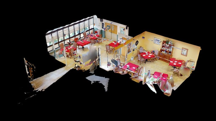 Interior view of a dining room with tables