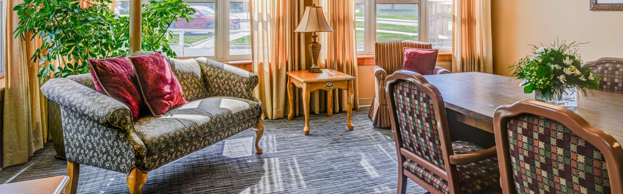 Cozy common area with comfortable seating and natural light