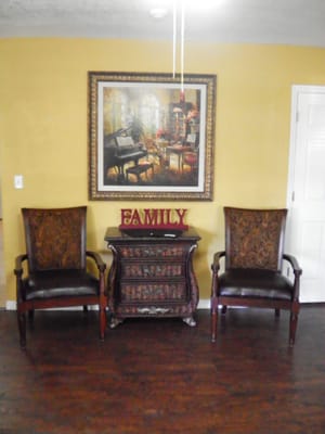 Interior seating area with family-themed decor