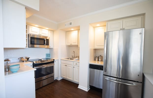 Bright kitchen area with modern appliances