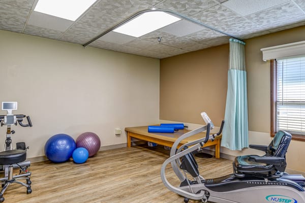 Interior view of a therapy room with equipment