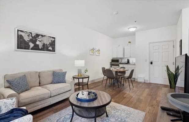 Cozy living space with modern furnishings and kitchen